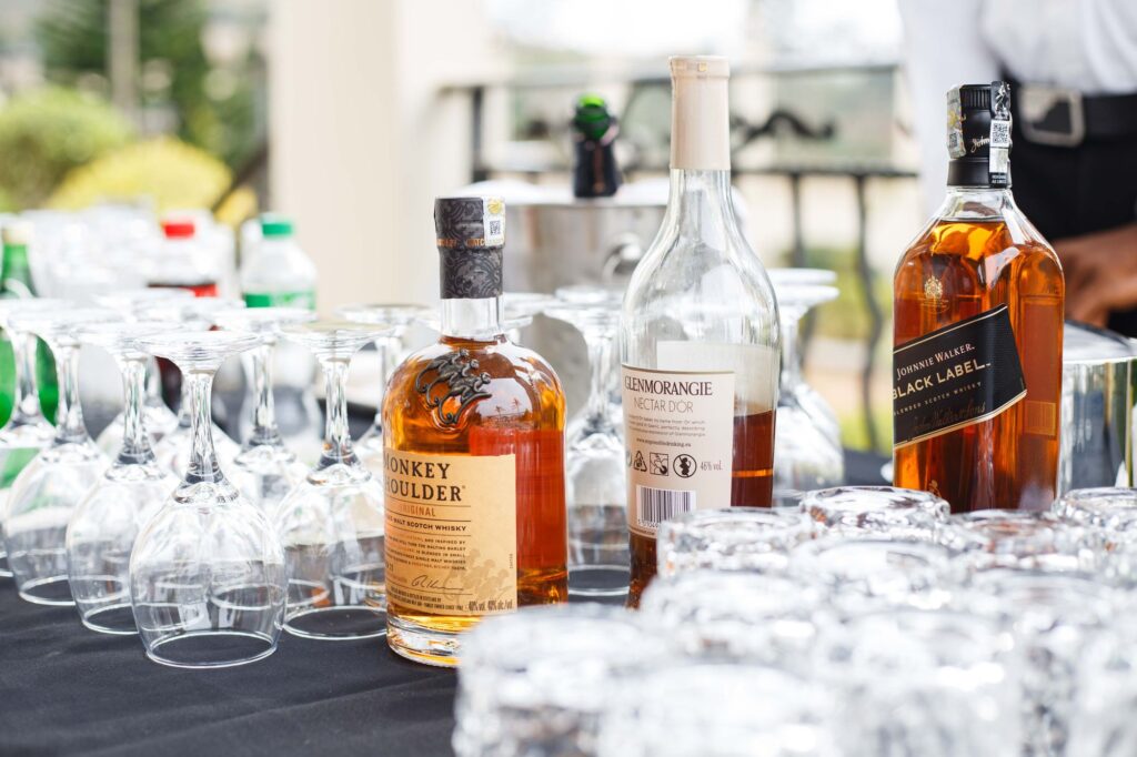 Bottles and glasses set out on the bar